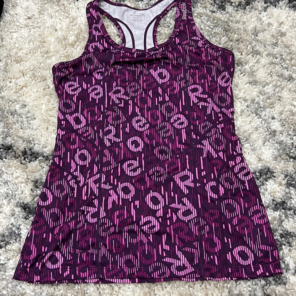 Purple Reebok shirt
